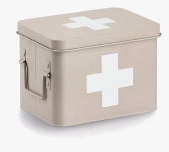 Bild av beige medicinsk plåtburk med vit korssymbol