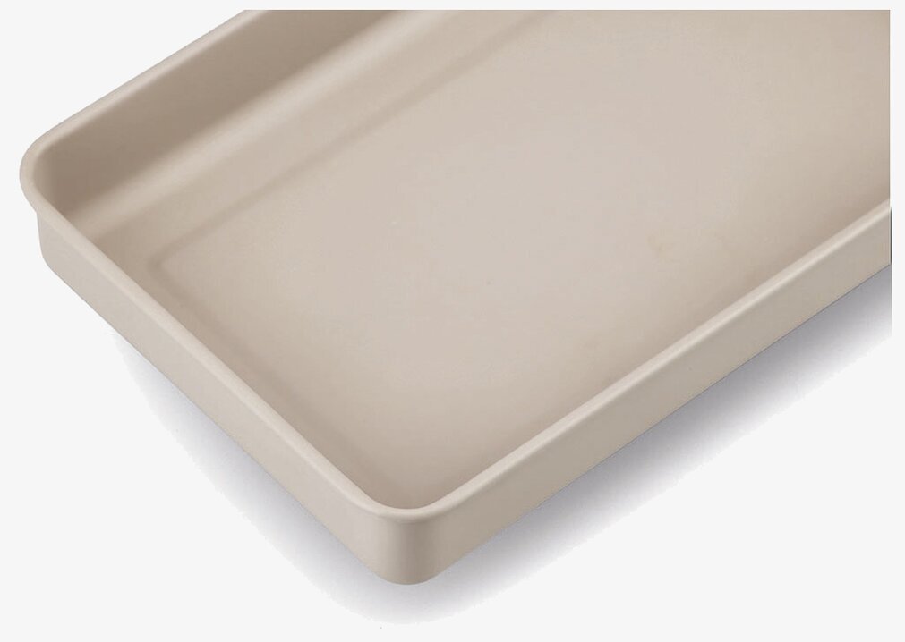 Bild av stor beige medicinförvaringslåda med rundade kanter